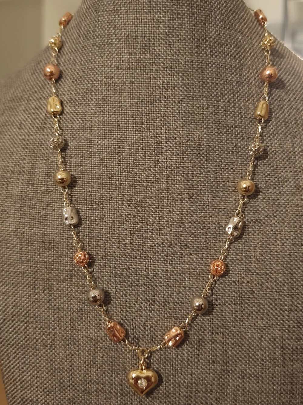 The surface is plated with a thin layer of real gold 14k
